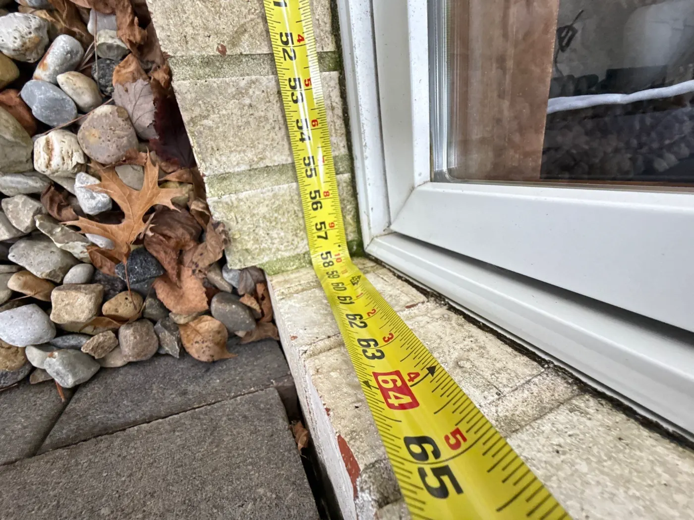 Storm-damaged window documented in Anson